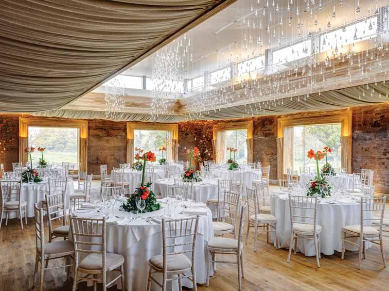 Designed to evoke romance, fall in love with these UK rustic barn venues offering quirky outbuildings, festival yurts and miles of coastal country views!
