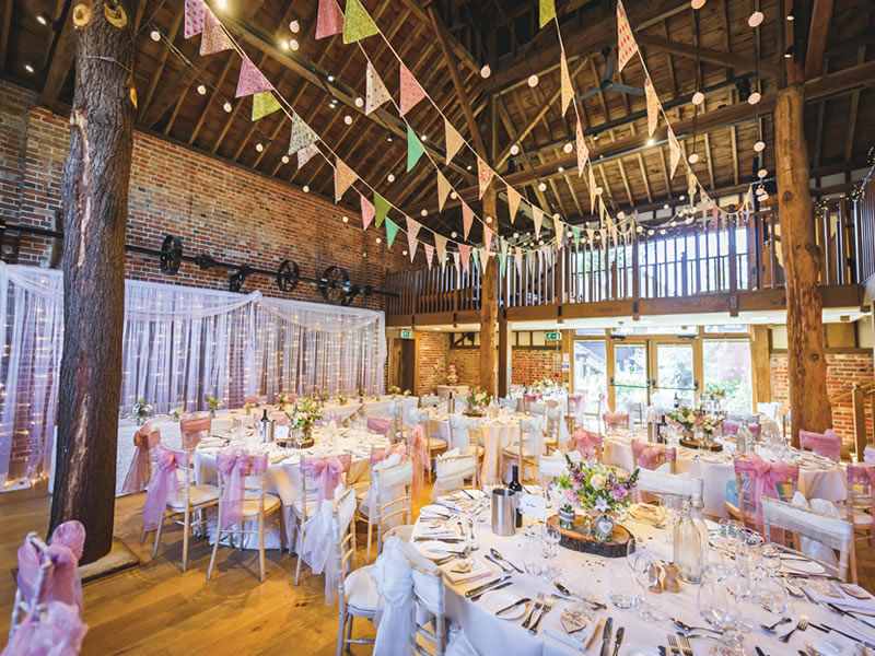 Designed to evoke romance, fall in love with these rustic UK barn venues offering quirky outbuildings, festival yurts and miles of coastal country views!