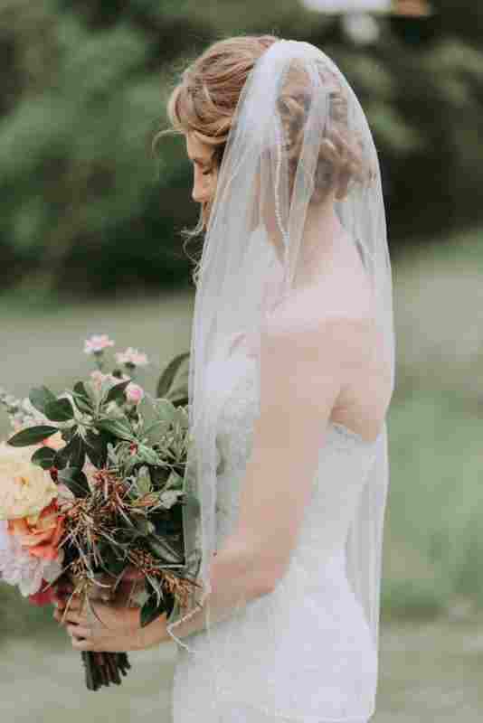 Wedding Hair Accessories: Your Guide to Bridal Hair Accessory Ideas wedding veil in hair