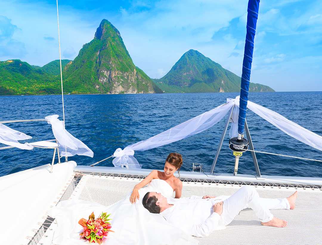 Serenity-Wedding-Couple-Catamaran-LayingDown